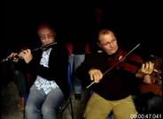 00:47 Eric Falcini et André Blouet à la flûte